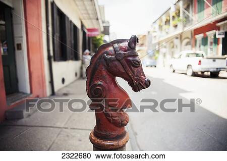 Stock Image - USA, Louisiana, French Quarter; New Orleans, Detail of ornate street hydrant. Fotosearch