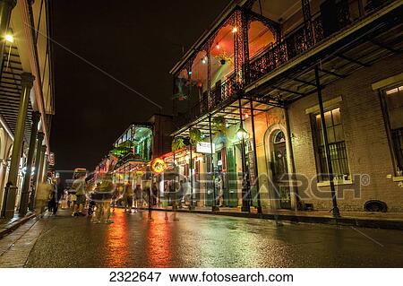 Stock Photo - USA, Louisiana, French Quarter; New Orleans, Bourbon Street, Night view of city street. Fotosearch