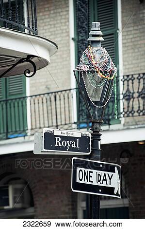USA, Louisiana, French Quarter; New Orleans, Street light with Mardi Grass decorations View Large Photo Image Stock Photo - USA, Louisiana, French Quarter; New Orleans, Street light with Mardi Grass decorations. Fotosearch