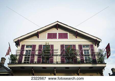 USA, Louisiana, French Quarter; New Orleans, Bourbon Street, Exterior of traditional house View Large Photo Image Stock Photo - USA, Louisiana, French Quarter; New Orleans, Bourbon Street, Exterior of traditional house. Fotosearch