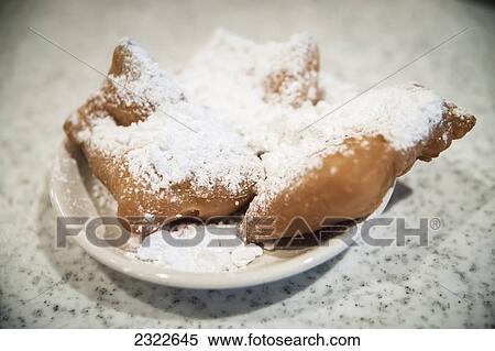 USA, Louisiana, French Quarter; New Orleans, Pastry with icing sugar View Large Photo Image Stock Photography - USA, Louisiana, French Quarter; New Orleans, Pastry with icing sugar. Fotosearch