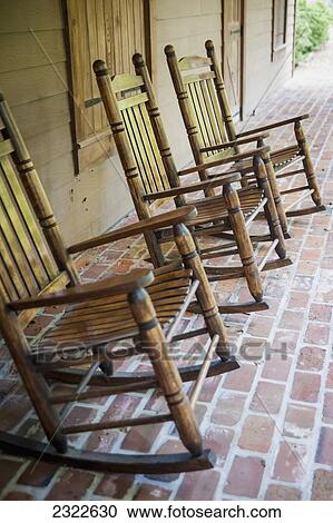 Stock Image - USA, Louisiana, Rocking chairs in Oakley Plantation; Audubon State. Fotosearch