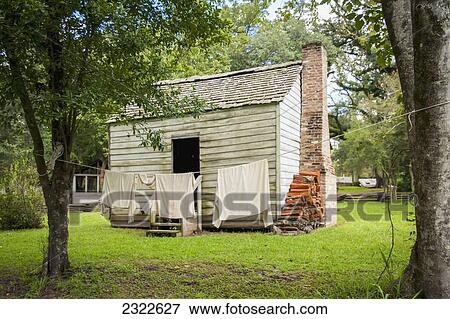 Stock Photo - USA, Louisiana, Slave cabin in Oakley Plantation; Audubon State. Fotosearch