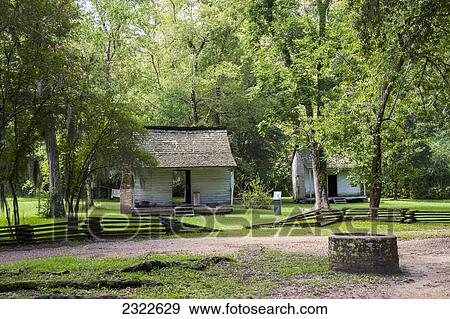 Stock Photo - USA, Louisiana, Slave cabins in Oakley Plantation; Audubon State. Fotosearch