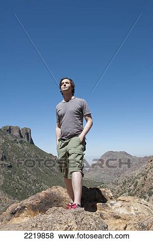 USA, Man contemplating landscape; Texas View Large Photo Image Stock Photo - USA, Man contemplating landscape; Texas. Fotosearch
