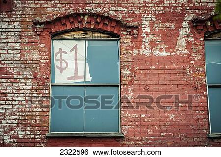 Stock Photograph - USA, Mississippi, One dollar written on paper in window; Vicksburg. Fotosearch