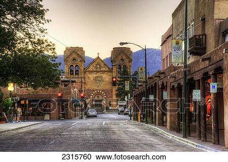 USA, New Mexico, Santa Fe, East San Francisco Street looking toward St. Francis of Assisi Cathedral at dawn View Large Photo Image Stock Image - USA, New Mexico, Santa Fe, East San Francisco Street looking toward St. Francis of Assisi Cathedral at dawn. Fotosearch