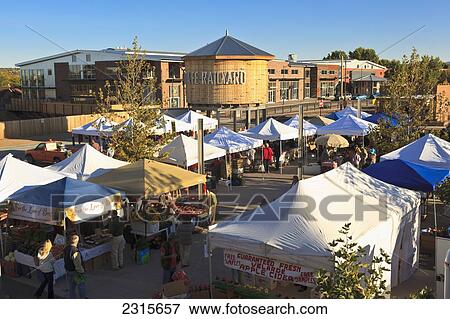 Stock Photo - USA, New Mexico, Santa Fe, View of Saturday Market next to rail yard. Fotosearch