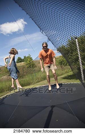 Usa, New York State, Man And Child On Trampoline; Hudson Valley View Large Photo Image Stock Image - Usa, New York State, Man And Child On Trampoline; Hudson Valley. Fotosearch