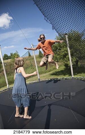 Usa, New York State, Man And Child On Trampoline; Hudson Valley View Large Photo Image Stock Photo - Usa, New York State, Man And Child On Trampoline; Hudson Valley. Fotosearch
