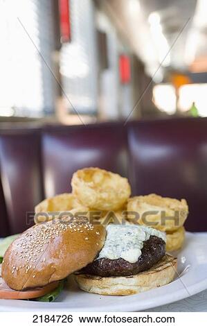 Stock Photograph - Usa, New York State, New York City, Brooklyn, Close-Up Of Cheeseburgers At Relish Diner; Williamsburg. Fotosearch
