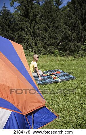 Usa, New York State, Woman Setting Up Picnic By Tent; Hudson Valley View Large Photo Image Stock Photo - Usa, New York State, Woman Setting Up Picnic By Tent; Hudson Valley. Fotosearch
