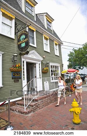 Stock Photo - Usa, Rhode Island, Newport, Old Fashioned Building And Pedestrians; Thames Street. Fotosearch