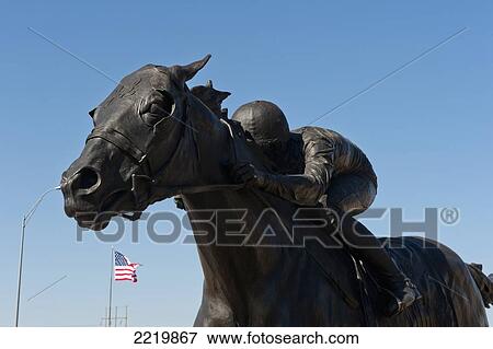USA, Sculpture of jockey with American flag in background; Texas View Large Photo Image Stock Photo - USA, Sculpture of jockey with American flag in background; Texas. Fotosearch