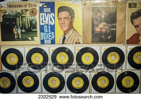 Stock Photo - USA, Tennessee, Sun Studio interior with collection of Elvis vinyls; Memphis. Fotosearch
