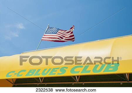 USA, Tennessee, US Flag on top of CC Blues Club; Memphis View Large Photo Image Stock Photo - USA, Tennessee, US Flag on top of CC Blues Club; Memphis. Fotosearch