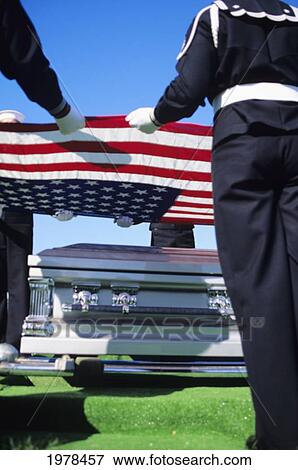 USA, Virginia, Military men in uniform at funeral holding American Flag; Arlington Cemetary View Large Photo Image Stock Photo - USA, Virginia, Military men in uniform at funeral holding American Flag; Arlington Cemetary. Fotosearch