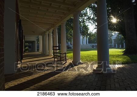Stock Image - USA, Virginia, Wooden rocking chair. Rotunda and academical village. University of Virginia. Founded by Thomas Jefferson; Charlottesville. Fotosearch