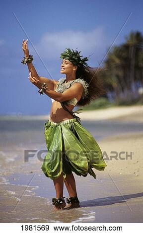 USA, Young woman dancing Hula on beach; Hawaii View Large Photo Image Stock Photo - USA, Young woman dancing Hula on beach; Hawaii. Fotosearch