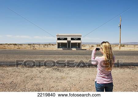 USA, Young woman photographing abandoned building near country road; Texas View Large Photo Image Stock Image - USA, Young woman photographing abandoned building near country road; Texas. Fotosearch