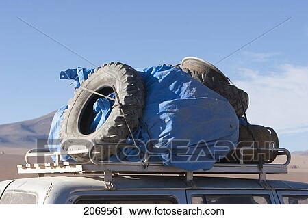 Used Spare Tires On The Roof Of A 4X4 Vehicle, Eduardo Avaroa National Park, Potosi Department, Bolivia View Large Photo Image Stock Image - Used Spare Tires On The Roof Of A 4X4 Vehicle, Eduardo Avaroa National Park, Potosi Department, Bolivia. Fotosearch