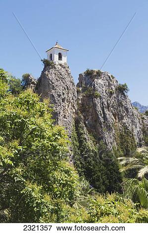 usually know as Guadalest, with tower above entrance to old section; El Castell de Guadalest, Alicante Province, Spain View Large Photo Image Stock Photo - usually know as Guadalest, with tower above entrance to old section; El Castell de Guadalest, Alicante Province, Spain. Fotosearch