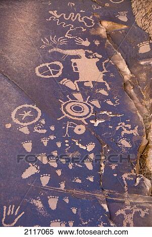 Stock Photography - Utah, Ancient Petroglyph on Newspaper Rock near Monticello.. Fotosearch