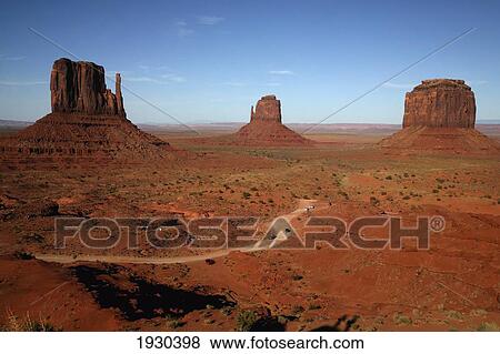 Stock Photo - Utah/Arizona, Usa. The Most Recognizable Navajo Sanstone Formations In Monument Valley, The East And West Mitten And Merrick Butte.. Fotosearch