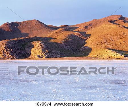 Picture - Uyuni Salt Flat And Hills At Sunrise. Fotosearch