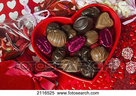 Valentines heart-shaped tray with an assortment of treats. View Large Photo Image Stock Photography - Valentines heart-shaped tray with an assortment of treats.. Fotosearch