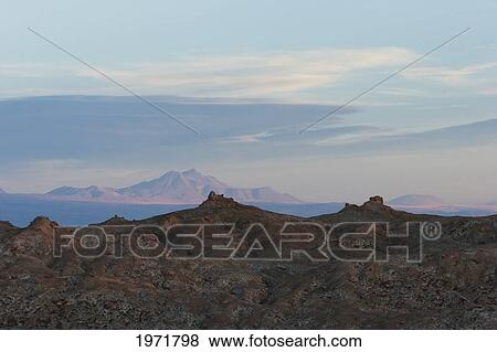 Valle De La Luna (Moon Valley) In The Cordillera De La Sal At Dusk, San Pedro De Atacama, Antofagasta Region, Chile View Large Photo Image Stock Photo - Valle De La Luna (Moon Valley) In The Cordillera De La Sal At Dusk, San Pedro De Atacama, Antofagasta Region, Chile. Fotosearch