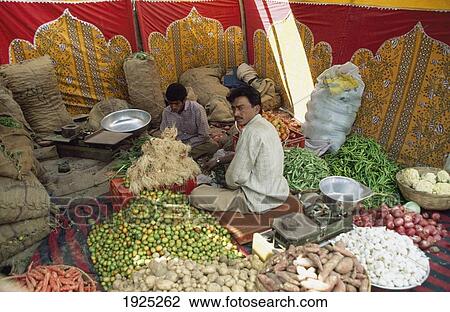 Stock Image - Vegetable Stall At Village Fair. Fotosearch