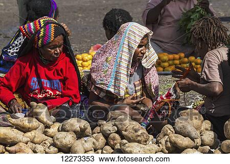 Vegetable vendors at the market, Wamena, Papua, Indonesia View Large Photo Image Stock Image - Vegetable vendors at the market, Wamena, Papua, Indonesia. Fotosearch