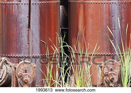 Vegetation Growing Amongst The Rusting Machinery Of Volklinger Hutte (Volklingen Ironworks), Volklingen, Germany View Large Photo Image Stock Image - Vegetation Growing Amongst The Rusting Machinery Of Volklinger Hutte (Volklingen Ironworks), Volklingen, Germany. Fotosearch