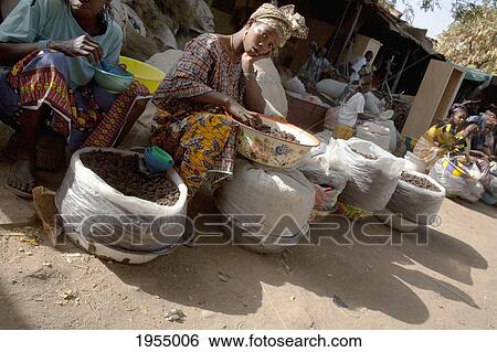 Stock Photograph - Vendors in market at Bamako, Mali. Fotosearch