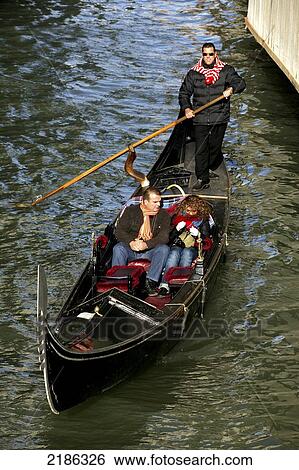 Stock Photograph - Venice, Italy. A Sunny Winter Morning Gondola Ride. Doug Mckinlay/Axiom. Fotosearch