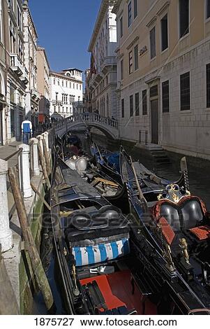 Stock Photo - Venice, Italy; Gondolas In A Narrow Canal. Fotosearch