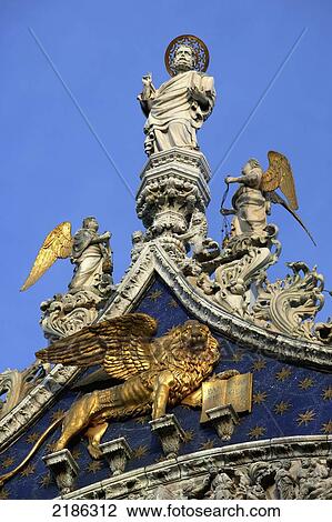 Stock Image - Venice, Italy. Statue On Top Of The Basilica Di San Marco. Doug Mckinlay/Axiom. Fotosearch