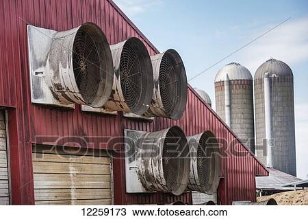 Stock Image - Ventilation fans on a farm building; Ridgley, Maryland, United States of America. Fotosearch