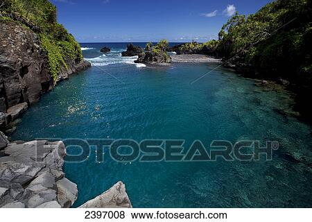 Venus Pool's blue water; Hana, Maui, Hawaii, United States of America View Large Photo Image Stock Photo - Venus Pool's blue water; Hana, Maui, Hawaii, United States of America. Fotosearch