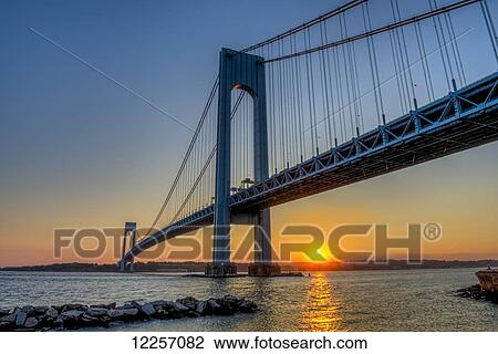Verrazano-Narrows Bridge at sunset, Brooklyn; New York City, New York, United States of America View Large Photo Image Stock Image - Verrazano-Narrows Bridge at sunset, Brooklyn; New York City, New York, United States of America. Fotosearch