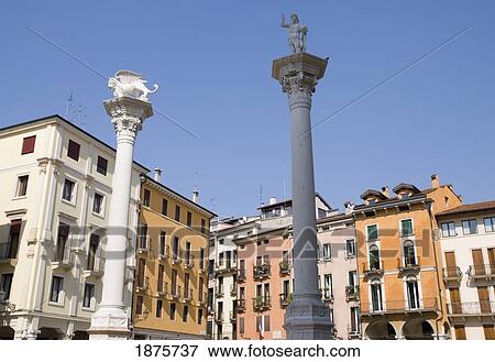 Vicenza, Italy; Sculpted Columns In A Square With Colorful Buildings View Large Photo Image Stock Photo - Vicenza, Italy; Sculpted Columns In A Square With Colorful Buildings. Fotosearch
