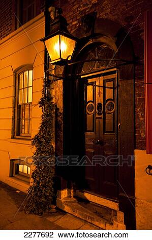 Victorian street lamp lights streets of East London at night; London, England View Large Photo Image Stock Image - Victorian street lamp lights streets of East London at night; London, England. Fotosearch