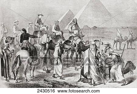 Stock Photograph - Victorian tourists at the pyramids of Giza, Egypt in the nineteenth century. From Edward VII His Life and Times, published 1910.. Fotosearch