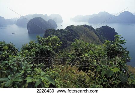 Stock Image - Vietnam, Landscape; Ha Long Bay. Fotosearch