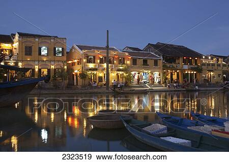 Vietnam, UNESCO World Heritage Site; Hoi An, Town waterfront of historic town at dusk View Large Photo Image Stock Photo - Vietnam, UNESCO World Heritage Site; Hoi An, Town waterfront of historic town at dusk. Fotosearch