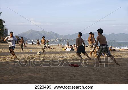 Vietnam, Young Men Playing Football; Nha Trang View Large Photo Image Stock Image - Vietnam, Young Men Playing Football; Nha Trang. Fotosearch