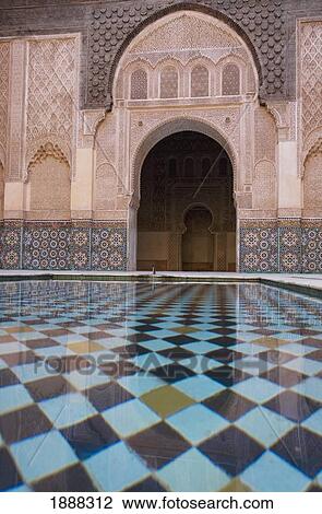 View Across An Ornamental Pool At An Arch In A Courtyard At Ali Ben Youssef Medresa, Marrakesh, Morocco. View Large Photo Image Stock Image - View Across An Ornamental Pool At An Arch In A Courtyard At Ali Ben Youssef Medresa, Marrakesh, Morocco.. Fotosearch