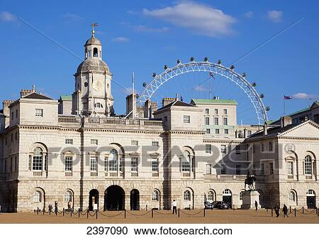 Stock Image - View across Horse Guards Parade and view of London Eye ferris wheel; London, England. Fotosearch