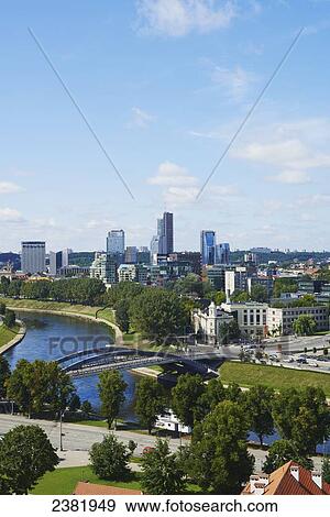 View across Neris River to corporate district from Gediminas Hill; Vilnius, Lithuania View Large Photo Image Stock Photo - View across Neris River to corporate district from Gediminas Hill; Vilnius, Lithuania. Fotosearch